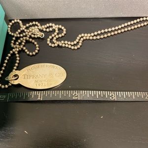 Vintage Tiffany & Co dog chain pendant and ball chain.